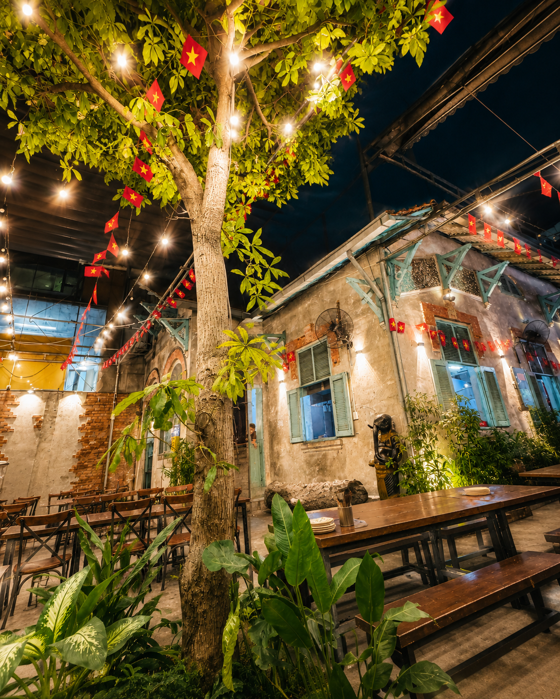 Indoor Courtyard Dining Around a Living Tree - Lão Trư Saigon
